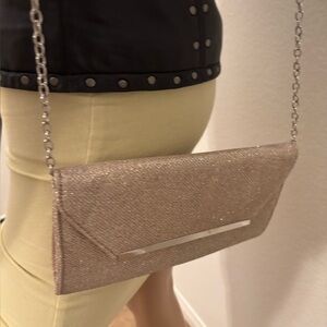 “Glint” from Nordstroms. Elegant,Evening Gold Clutch Bag or with chain option.